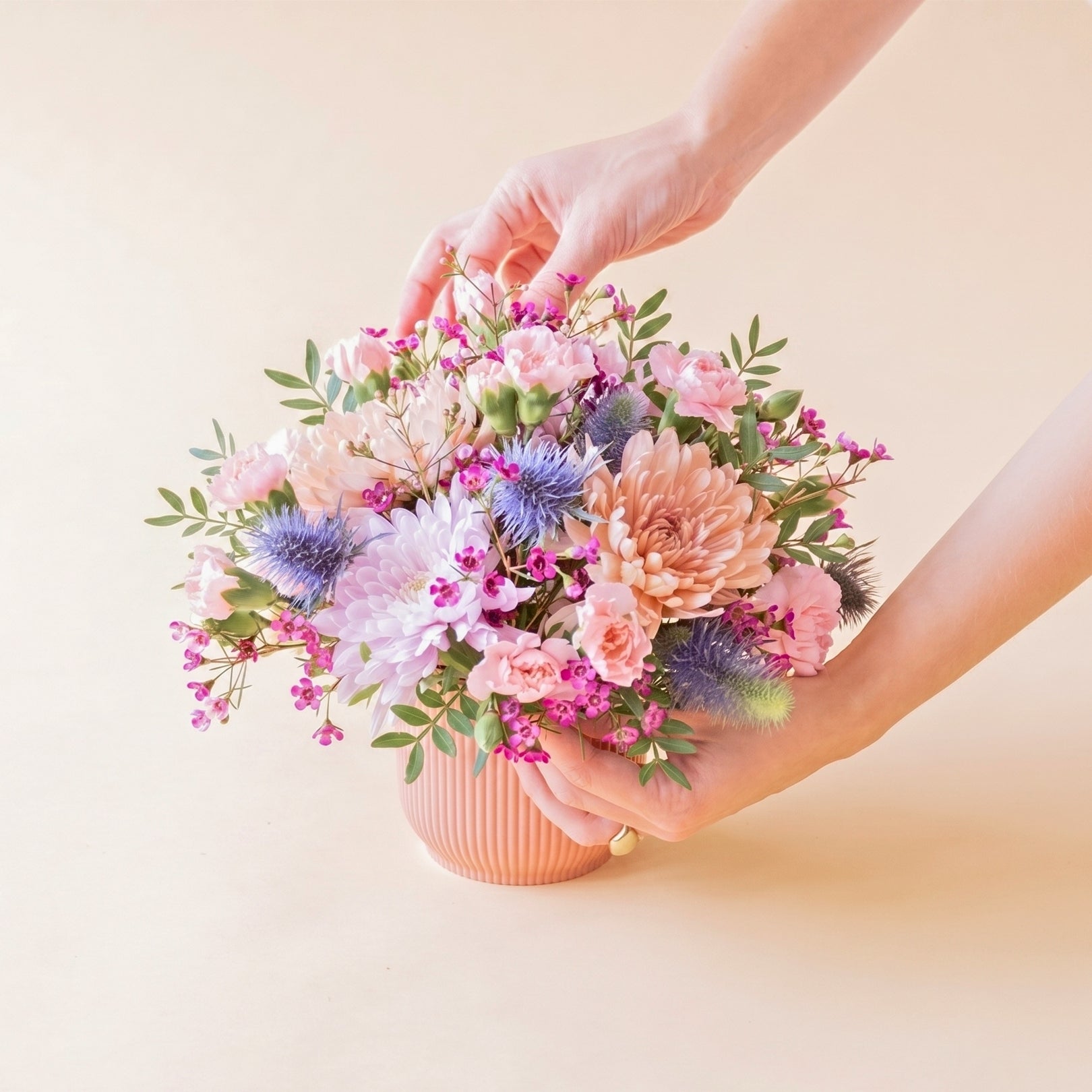The Wink – Purple and Blue Flower Arrangement